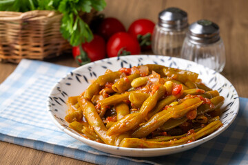 Traditional delicious Turkish food; Green beans with olive oil; Turkish name; Zeytinyagli taze fasulye