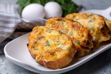 Turkish Egg Breads. It is called "Yumurtali Ekmek" in Turkish. French Toast. Turkish and Arabic Traditional Breakfast Baked or Fried Egg Bread. Egg bread with cheese and parsley.