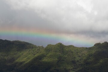 rainbow over the hawaiian mountains