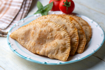 Traditional delicious Turkish foods,minced meat in savoury pastry (Turkish name; ci borek or cig borek)