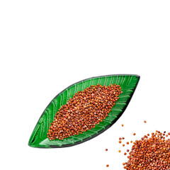 Chenopodium quinoa - Red organic quinoa seeds in leaf shaped bowl
