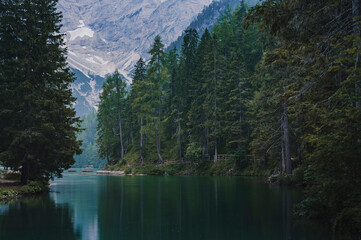 Lago di Braies (Braies lake, Pragser wildsee) Lake in South Tyrol, Italy ; moody evening (high ISO...