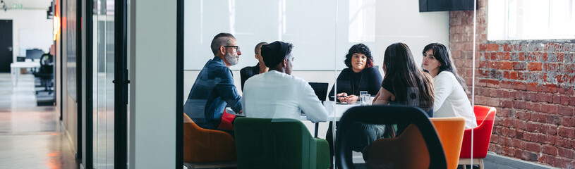 Team of colleagues having an important meeting in an office