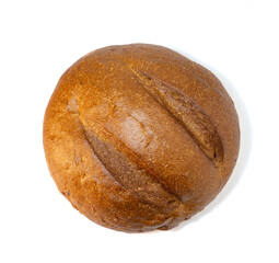 Round black bread on white background