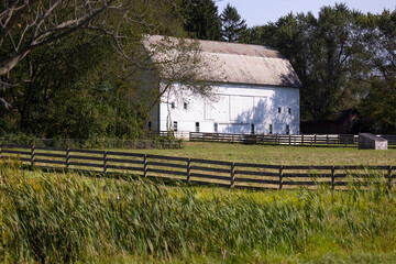 Old barn and fence in the countryside in the Cuyahoga Valley National Park, Cleveland, Ohio. 