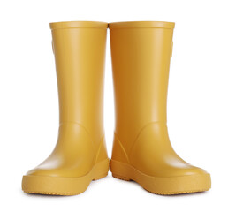 Modern yellow rubber boots isolated on white