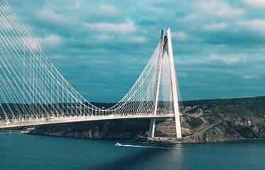 Fototapeta na wymiar Landscape view of modern hybrid cable-stayed, suspension bridge (Yavuz Sultan Selim) on Bosphorus, Istanbul..