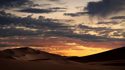 Plakat view from Nature and landscapes of dasht e lut or sahara desert at sunset. Middle East desert