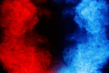 Blue and Red color powder explosion on black background. Colored cloud. Colorful dust explode. Paint Holi.