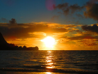 Beautiful sunset in Hawaii by ocean