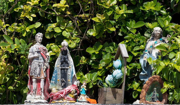 Diversity of religious images and statues in Brazil.