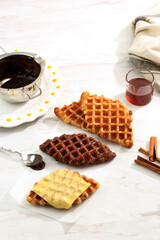 Croffle Croisant Waffle with Various Topping, Cheese, Chocolate, Sugar and Cinnamon.  Croffle is Viral Street Food from Korea.