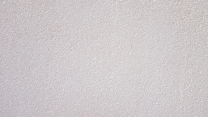 The walls of the building are painted white.