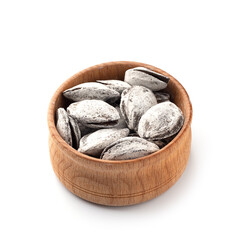 Salted apricot kernels fried in resin. Shur-donak bones in a wooden cup. Cancer prevention