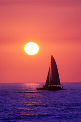 Sailboat silhouette at sunset