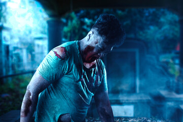 Scary zombie with blood and wound on his body walking
