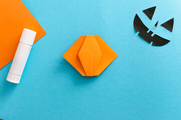 Step by step instruction how to make origami paper pumpkin A Jack O Lantern. Simple diy kids...