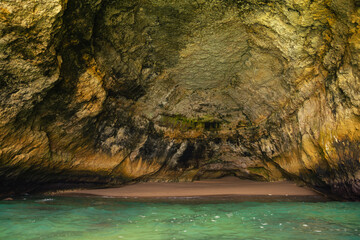 a stone cave in the sea