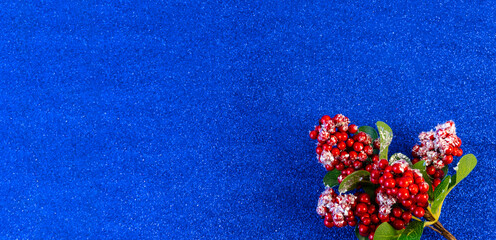 christmas and new year flat lay with copy space and with a new year toy on a blue background