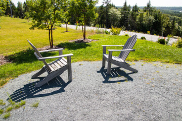 Two Adirondack chairs facing each other