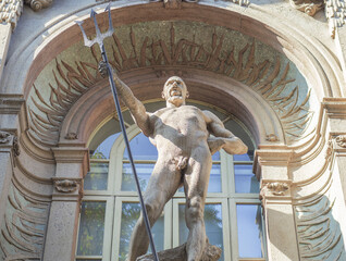 Neptune god of the sea holding a trident, 1906, statue at the entrance to the civic aquarium in...