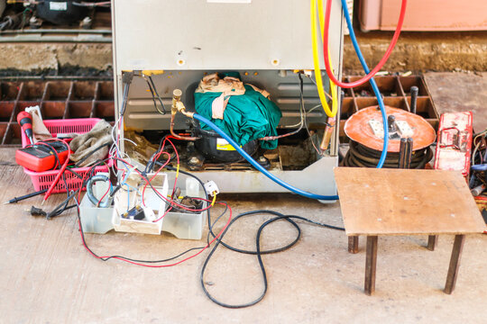 tool for technician repair refrigerator by vacuum at maintenance shop