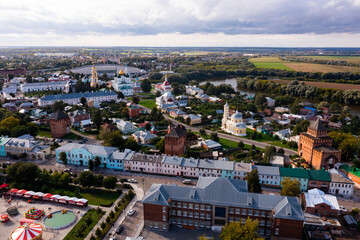 Aerial photo of Russian city Kolomna with view of residential buildings and churches.