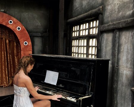 Young women playing the piano