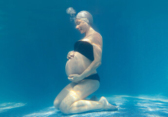 Pregnant woman in the pool.