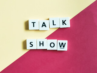 Word TALK SHOW center placed lettering created using square letter tiles
