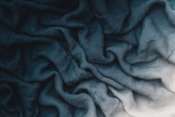 blue wavy soft folds of fabric