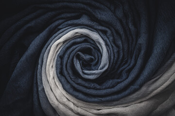 spiral folds of soft cotton fabric