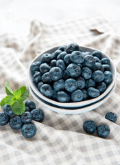 Blueberries on textile background
