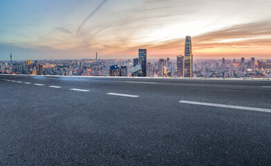 Empty asphalt road and city skyline and building landscape, China.