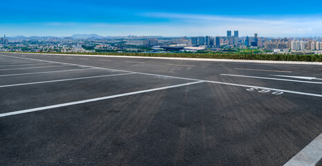 Empty asphalt road and city skyline and building landscape, China.