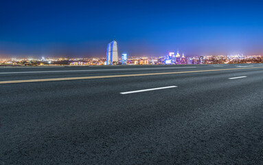 Empty asphalt road and city skyline and building landscape, China.