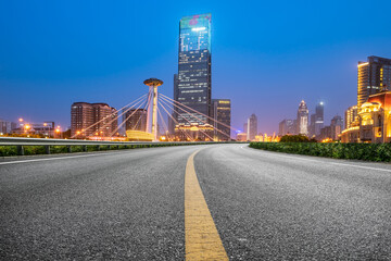 Fototapeta na wymiar Empty asphalt road and city skyline and building landscape, China.