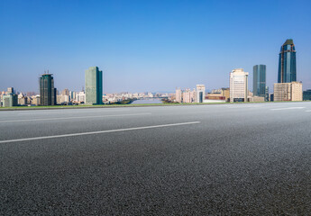 Fototapeta na wymiar Empty asphalt road and city skyline and building landscape, China.