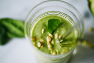 Vegan drink, detox diet smoothie with avocado and vegetables, spinach.