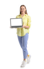 Beautiful young woman holding laptop with blank screen on white background