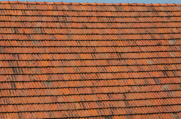 roof tile. tile roof of a old house. tile roofs used in old and modern style construction for safety and also it keeps house cool inside