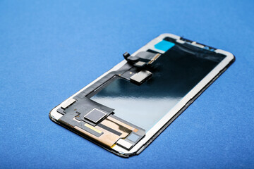 Mobile phone display module on blue background