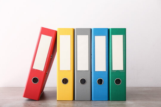 Office folders on light background