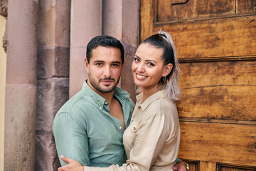 Young Latino male and female couple in love between 25 and 35 years of age