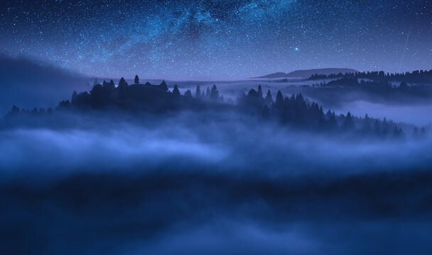 Colorful view of alpine valley at night