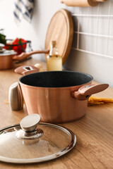 Copper cooking pot on counter in kitchen