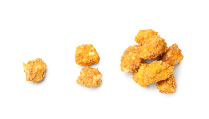 Crunchy popcorn chicken on white background