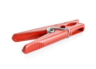 Red plastic clothespin on white background