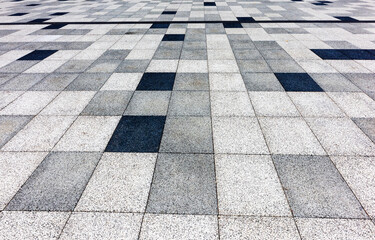 Outdoor pavement mosaic background in the city