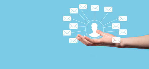 Male hand holding letter icon,email icons .Contact us by newsletter email and protect your personal...